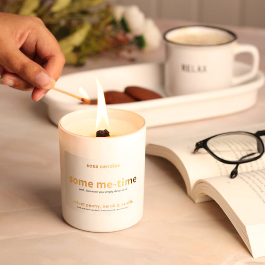 What are the costs involved in launching a small, eco-friendly candle business?